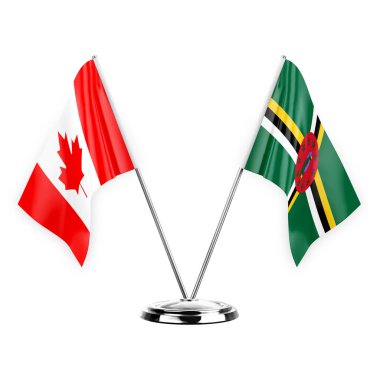 Two table flags isolated on white background 3d illustration, canada and dominica