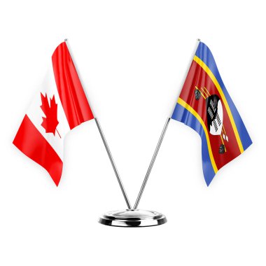 Two table flags isolated on white background 3d illustration, canada and eswatini