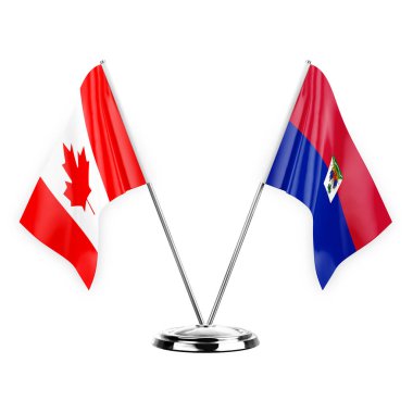Two table flags isolated on white background 3d illustration, canada and haiti