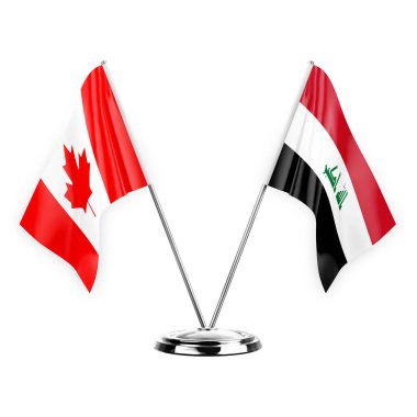 Two table flags isolated on white background 3d illustration, canada and iraq