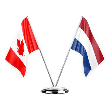 Two table flags isolated on white background 3d illustration, canada and netherlands