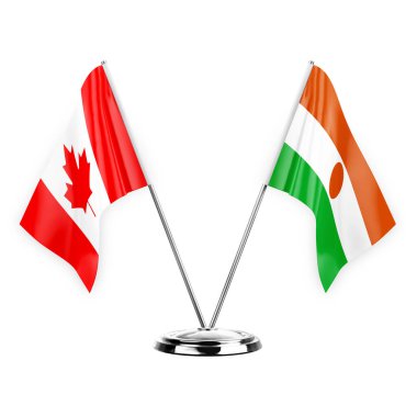Two table flags isolated on white background 3d illustration, canada and niger