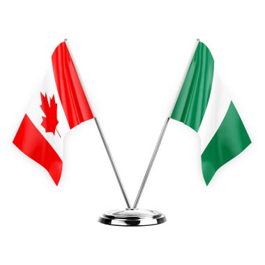 Two table flags isolated on white background 3d illustration, canada and nigeria