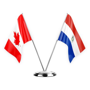 Two table flags isolated on white background 3d illustration, canada and paraguay