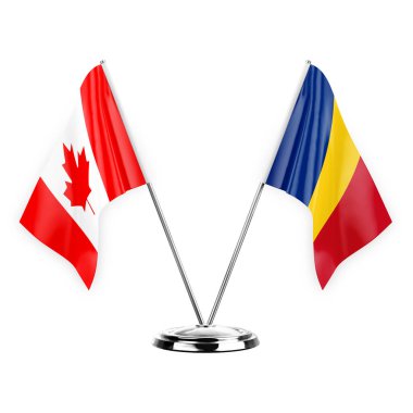Two table flags isolated on white background 3d illustration, canada and romania