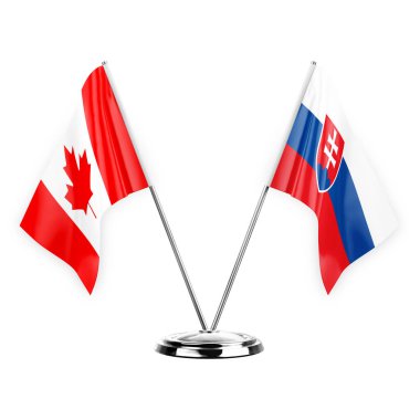 Two table flags isolated on white background 3d illustration, canada and slovakia