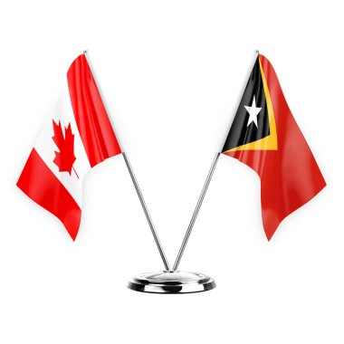 Two table flags isolated on white background 3d illustration, canada and timor leste