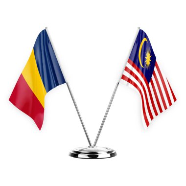 Two table flags isolated on white background 3d illustration, chad and malaysia