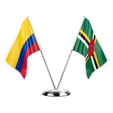 Two table flags isolated on white background 3d illustration, colombia and dominica