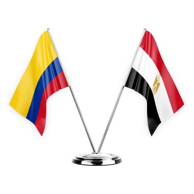 Two table flags isolated on white background 3d illustration, colombia and egypt