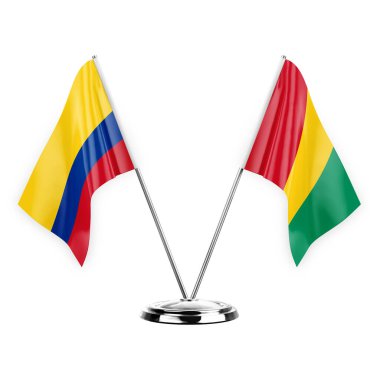 Two table flags isolated on white background 3d illustration, colombia and guinea