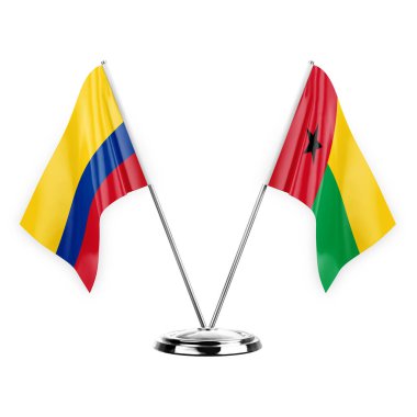 Two table flags isolated on white background 3d illustration, colombia and guinea-bissau