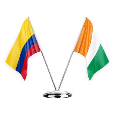 Two table flags isolated on white background 3d illustration, colombia and ivory coast