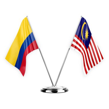Two table flags isolated on white background 3d illustration, colombia and malaysia