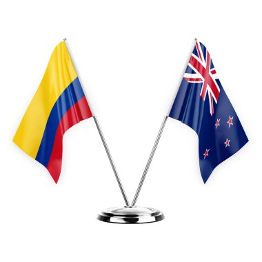 Two table flags isolated on white background 3d illustration, colombia and new zealand