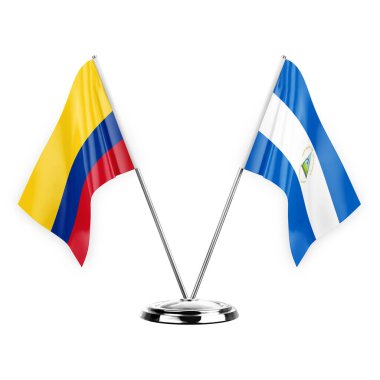 Two table flags isolated on white background 3d illustration, colombia and nicaragua