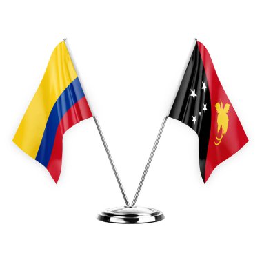 Two table flags isolated on white background 3d illustration, colombia and papua new guinea