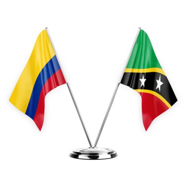 Two table flags isolated on white background 3d illustration, colombia and saint kitts and venis