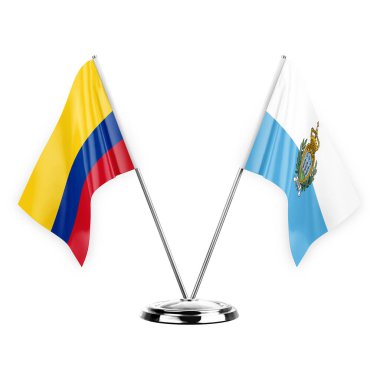 Two table flags isolated on white background 3d illustration, colombia and san marino