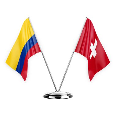 Two table flags isolated on white background 3d illustration, colombia and switzerland