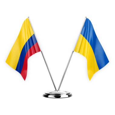 Two table flags isolated on white background 3d illustration, colombia and ukraine