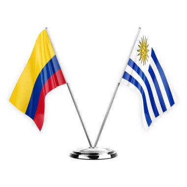 Two table flags isolated on white background 3d illustration, colombia and uruguay