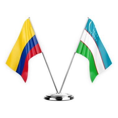 Two table flags isolated on white background 3d illustration, colombia and uzbekistan