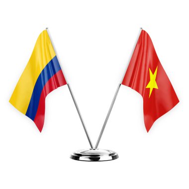 Two table flags isolated on white background 3d illustration, colombia and vietnam