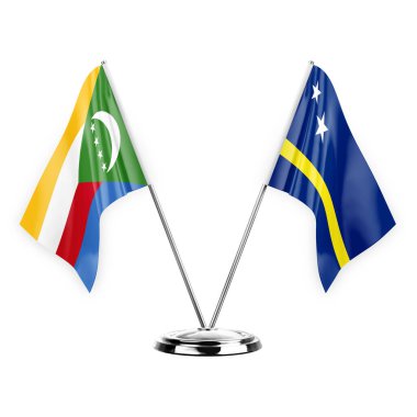 Two table flags isolated on white background 3d illustration, comoros and curacao