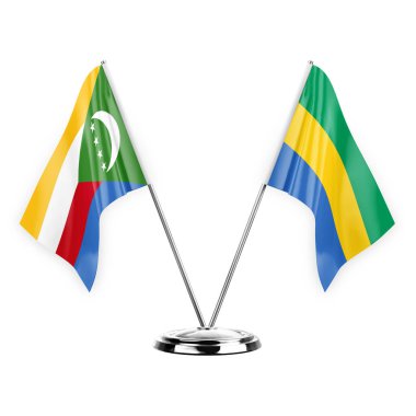 Two table flags isolated on white background 3d illustration, comoros and gabon