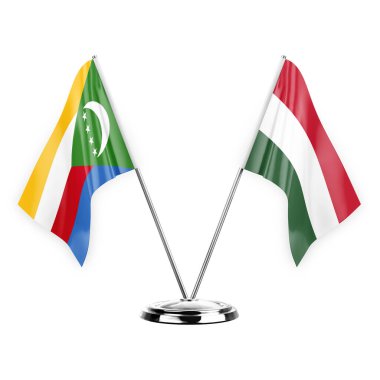 Two table flags isolated on white background 3d illustration, comoros and hungary