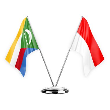 Two table flags isolated on white background 3d illustration, comoros and indonesia