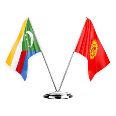 Two table flags isolated on white background 3d illustration, comoros and kyrgyzstan