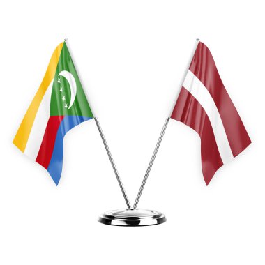 Two table flags isolated on white background 3d illustration, comoros and latvia
