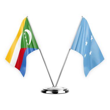 Two table flags isolated on white background 3d illustration, comoros and micronesia