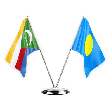 Two table flags isolated on white background 3d illustration, comoros and palau