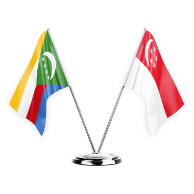 Two table flags isolated on white background 3d illustration, comoros and singapore