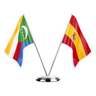 Two table flags isolated on white background 3d illustration, comoros and spain