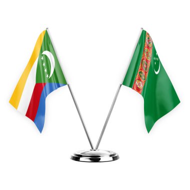 Two table flags isolated on white background 3d illustration, comoros and turkmenistan