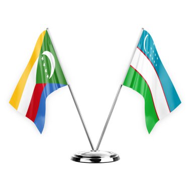 Two table flags isolated on white background 3d illustration, comoros and uzbekistan
