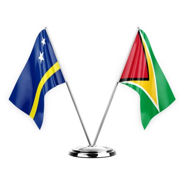Two table flags isolated on white background 3d illustration, curacao and guyana