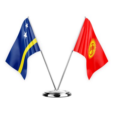 Two table flags isolated on white background 3d illustration, curacao and kyrgyzstan