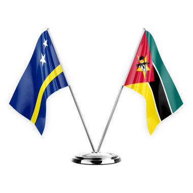 Two table flags isolated on white background 3d illustration, curacao and mozambique