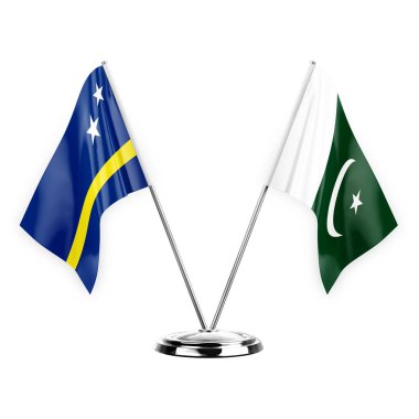 Two table flags isolated on white background 3d illustration, curacao and pakistan