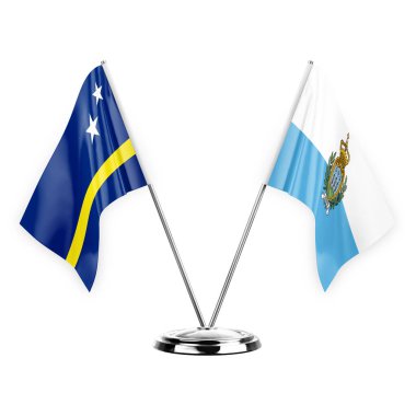 Two table flags isolated on white background 3d illustration, curacao and san marino