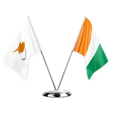 Two table flags isolated on white background 3d illustration, cyprus and ivory coast