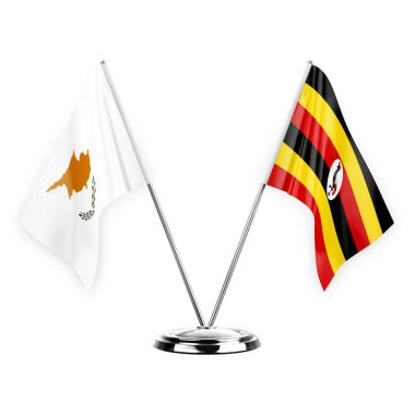 Two table flags isolated on white background 3d illustration, cyprus and uganda