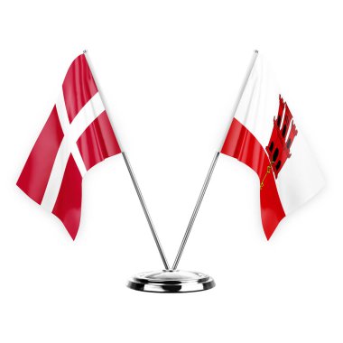 Two table flags isolated on white background 3d illustration, denmark and gibraltar