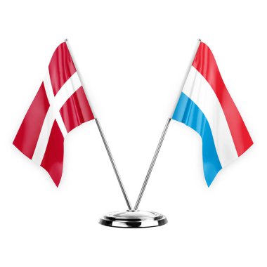 Two table flags isolated on white background 3d illustration, denmark and luxembourg