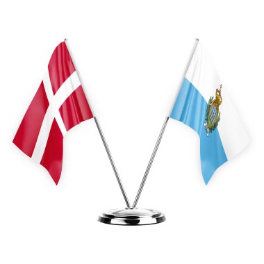 Two table flags isolated on white background 3d illustration, denmark and san marino